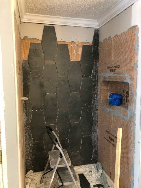 Shower tile on back wall of master bathroom shower nook