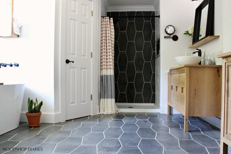 Master Bathroom Final Reveal right side of room shower nook, bathtub nook, vanity and closet view--white oak vanity, dark grey tile