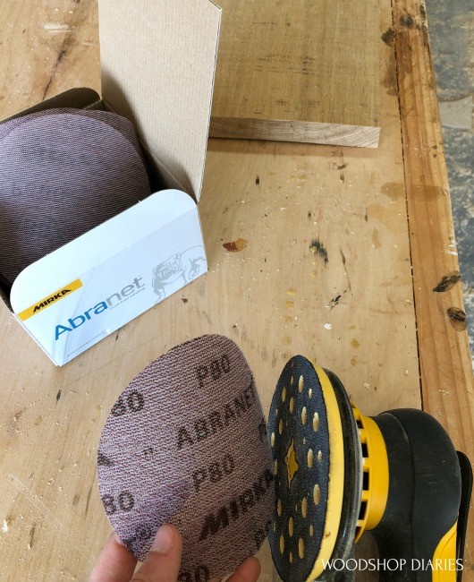 sticking 80 grit sand paper onto mirka sander