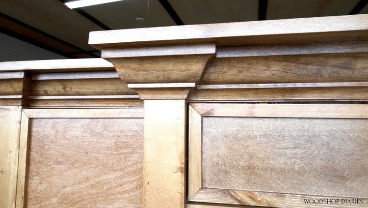 Crown molding wrapped around face frame of console cabinet
