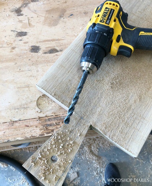 Drill used to drill hole into handle of serving board
