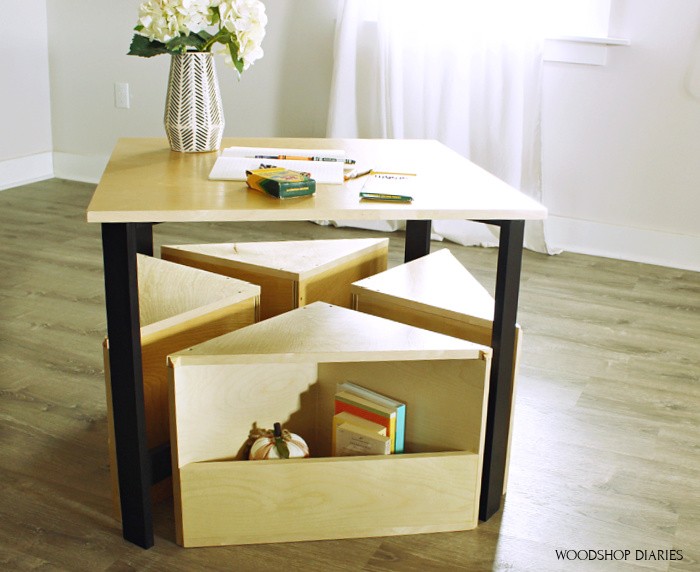 Kids nesting table with seats neatly tucked underneath