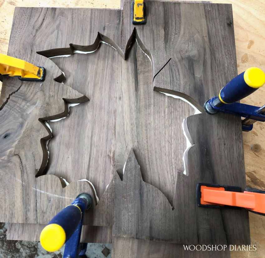 Leaf cutout glued and clamped for DIY fall project leaf tray.