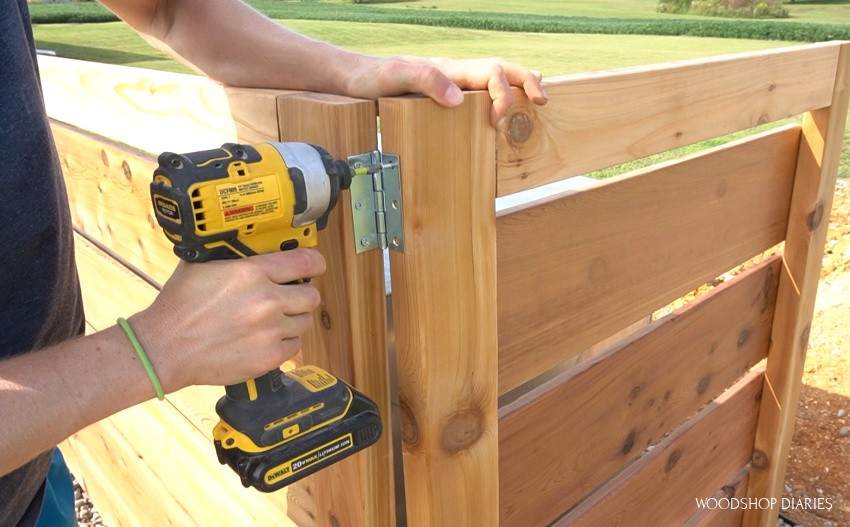 Using hinges to secure two fence panels together so they can fold down easy when they need to be moved