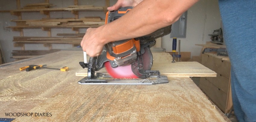 Shara using circular saw at beveled angle to make side panel cuts for blessing box