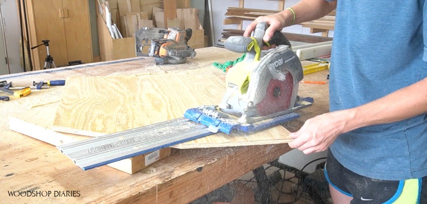 Shara Woodshop Diaries using circular saw to trim roof line of blessing birdhouse
