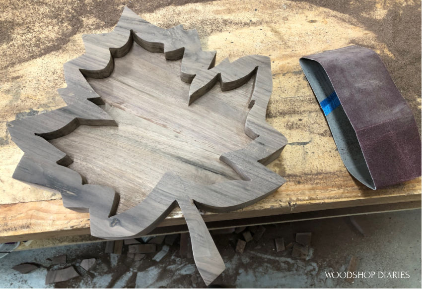 Cut around final shape to make DIY fall project leaf tray, including the stem.