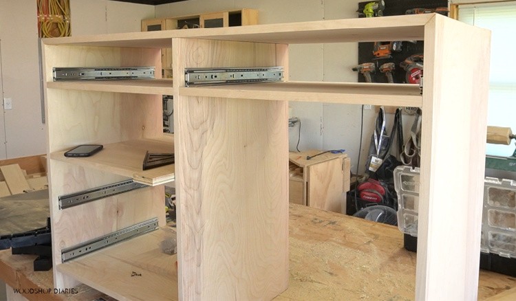 Drawer slides installed into dresser desk cubby holes