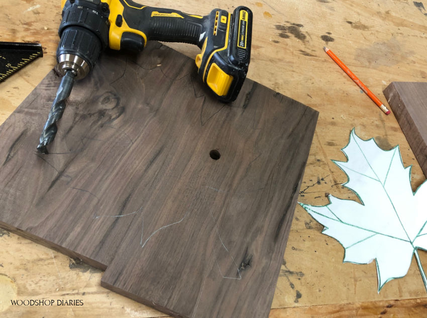 Hole drilled inside leaf shape on scrap wood to use jigsaw