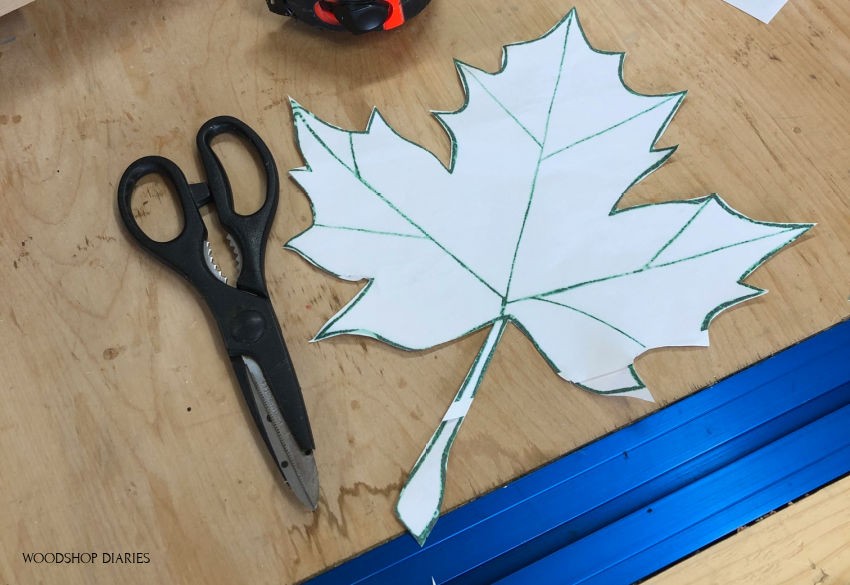 Template cut out of paper for DIY fall project leaf tray.