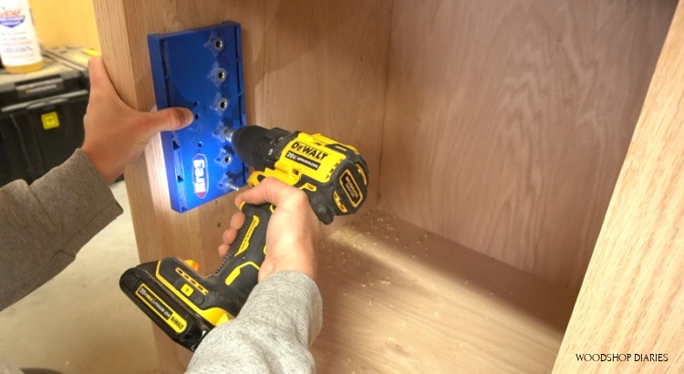 Drill shelf pin holes for adjustable shelves in desk cabinets