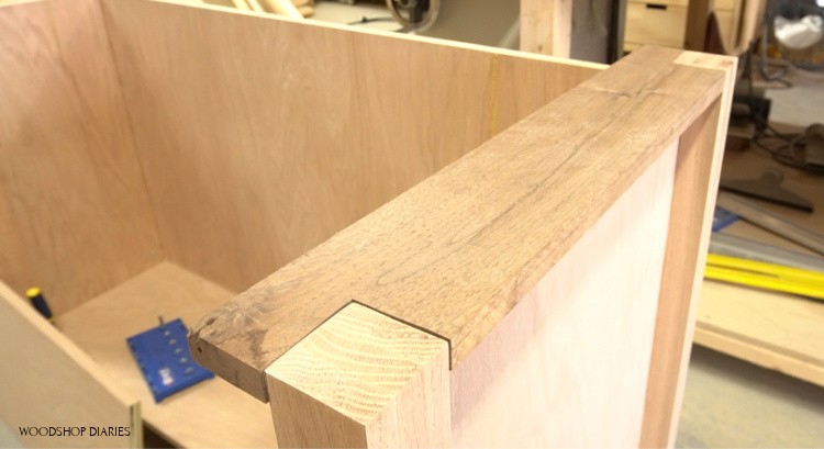 Walnut boards glued in place on desk corners