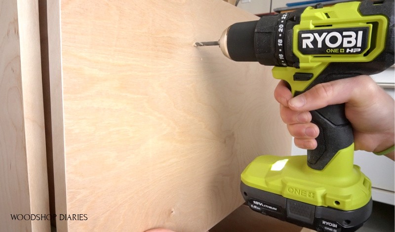 Ryobi ONE+ HP drill drilling holes for file cabinet drawer hardware