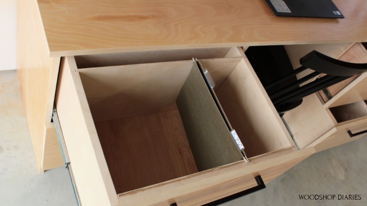 Close up of side to side filing cabinet drawer railing system using ¼" plywood