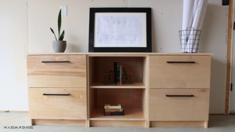 Modular home office storage cabinets--two filing cabinets and a shelving unit set up as a single console cabinet