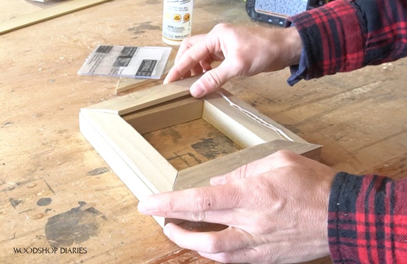 Glue lattice onto back of 1x2 picture frame to install glass