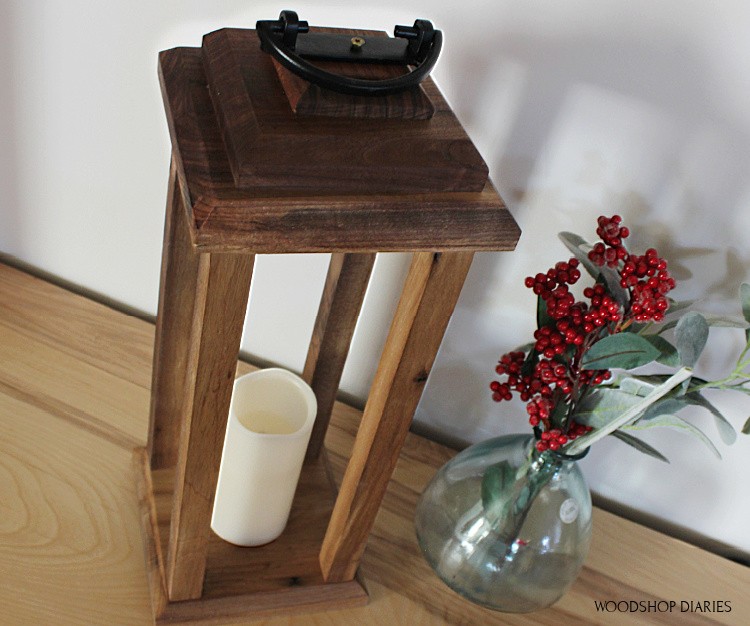 Finished wooden lantern with top handle attached