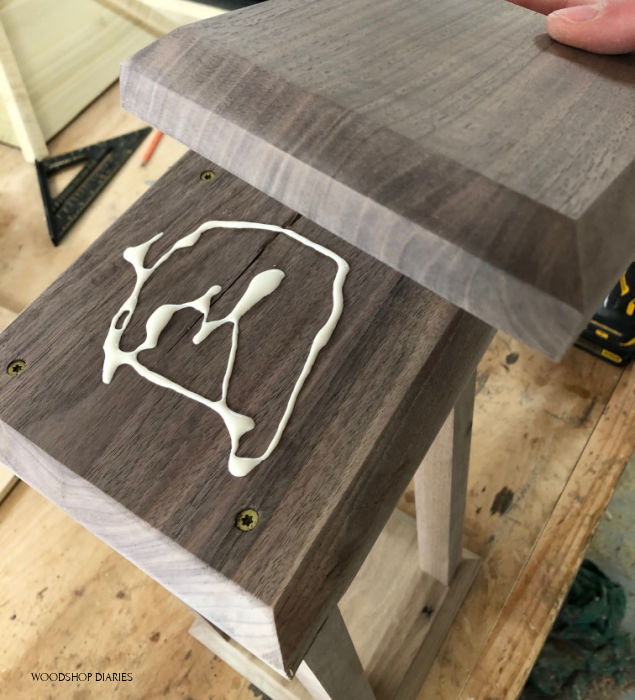 Glue decorative top plates onto scrap wood lantern