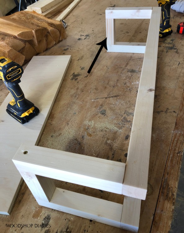 Back stretcher pieces attached onto DIY firewood rack assembly