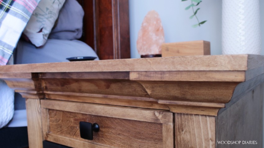 Close up of crown molding trim added onto face frame