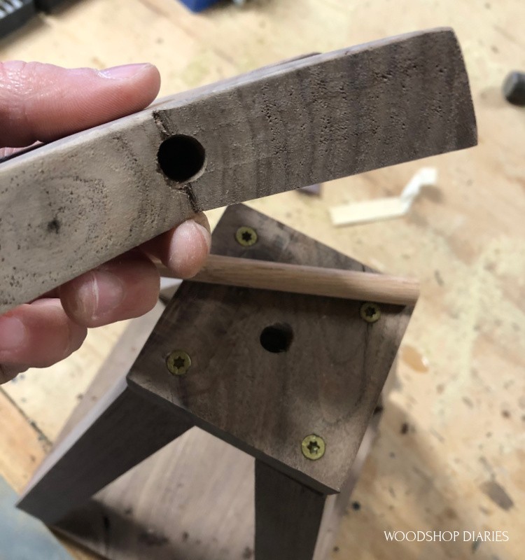 Holes drilled for dowel rod to attach star to top of stackable Christmas tree shelf