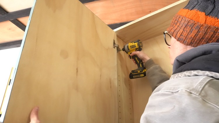 Installing door onto DIY garage cabinet