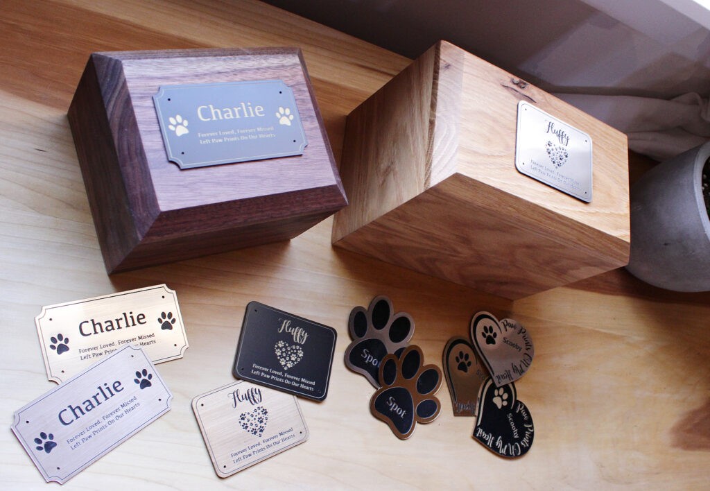 Large and small DIY pet urns with personalized plates