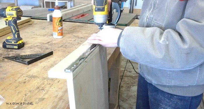 Installing drawer slides onto desk pull out tray