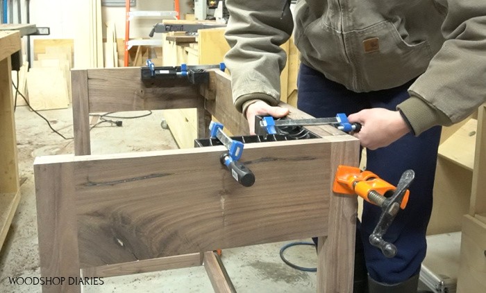 Using corner clamps to secure glue up