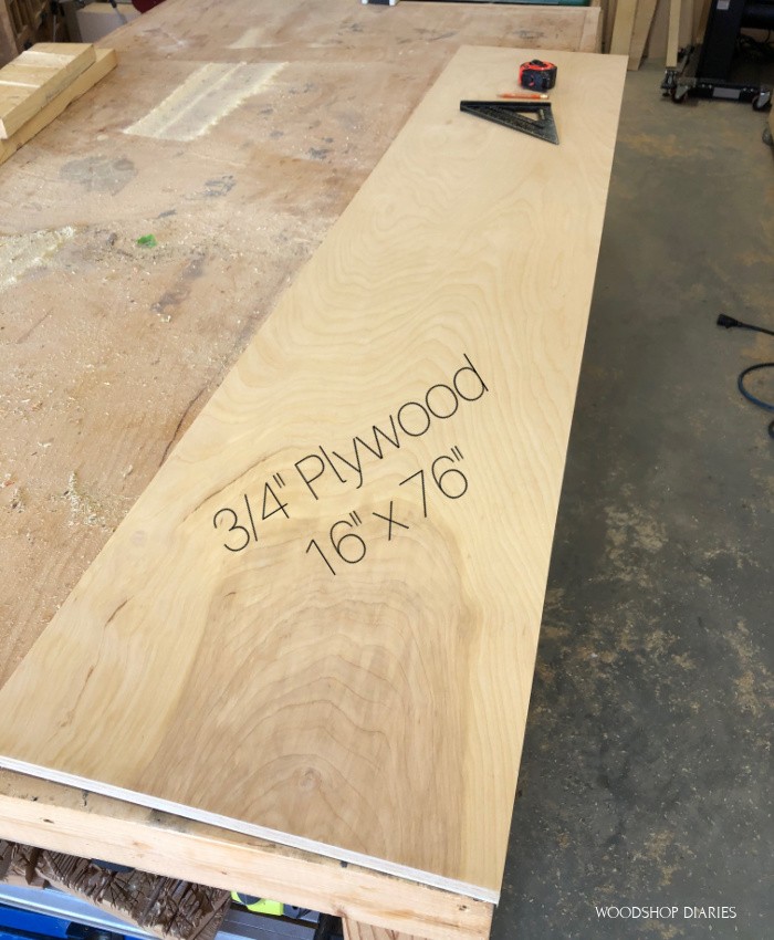 a 16" x 76" piece of ¾" plywood laying on workbench