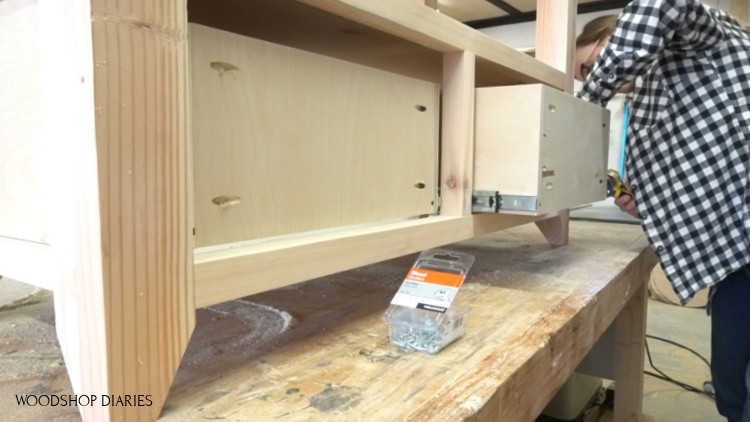 Shara Woodshop Diaries installing drawer boxes into DIY shelf frame