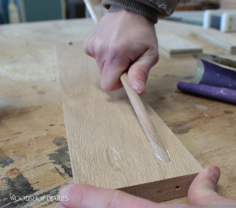 Inserting dowel rod into pocket hole 