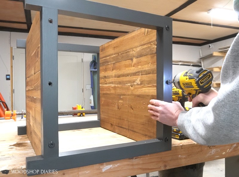 Shara Woodshop Diaries driving timber screw through end table frame to attach top shelf