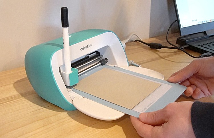 Loading cardstock into Cricut Joy Machine on Card Mat