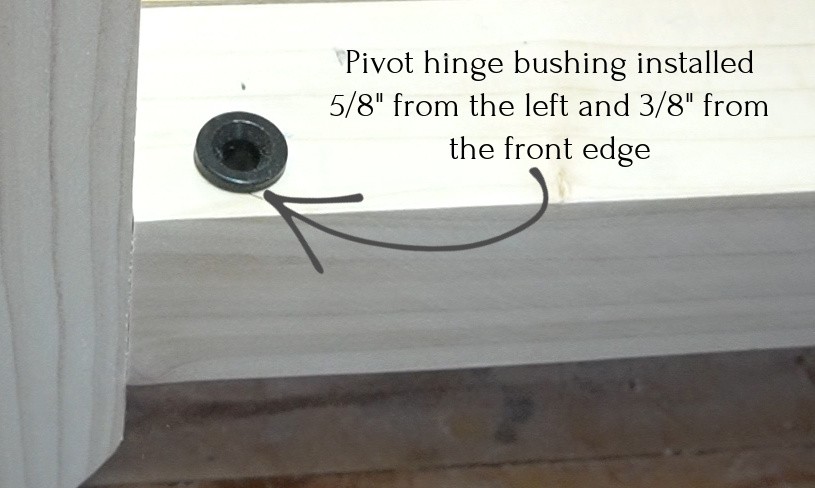 Close up of pivot hinge bushing installed into cabinet frame