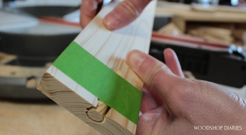 Pocket hole plug cut free on end of board close up