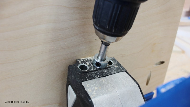 Close up of stop collar touching drill guide on pocket hole jig