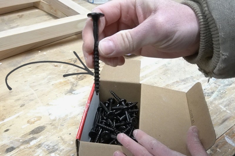 Close up of timber screws used to attach shelves on end table