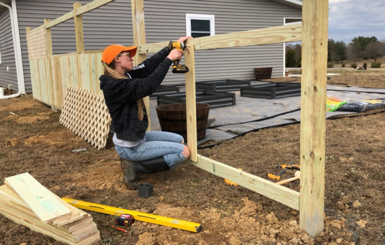 Attaching middle fence picket to privacy fence frame