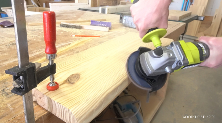 Using angle grinder to carve fake live edge onto pine board