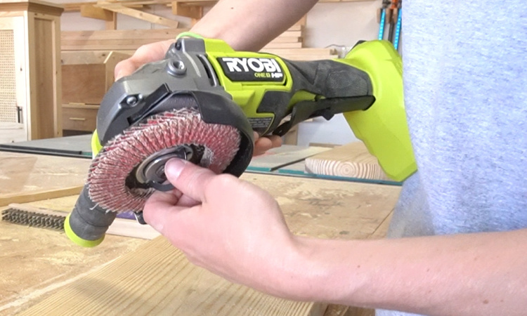 Shara Woodshop Diaries installing a flap disc into angle grinder 