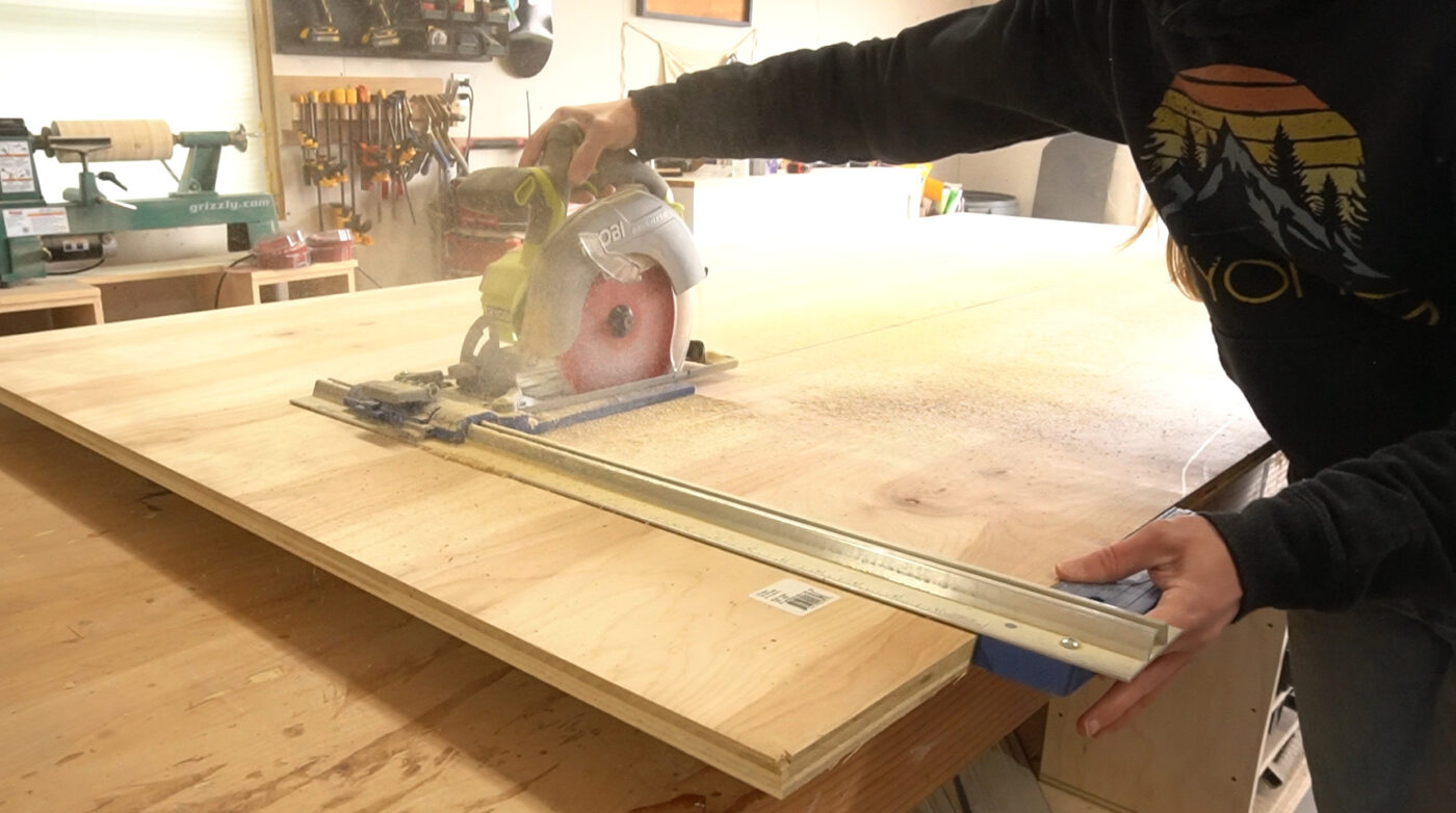 Shara Woodshop Diaries cutting down plywood sheet with circular saw