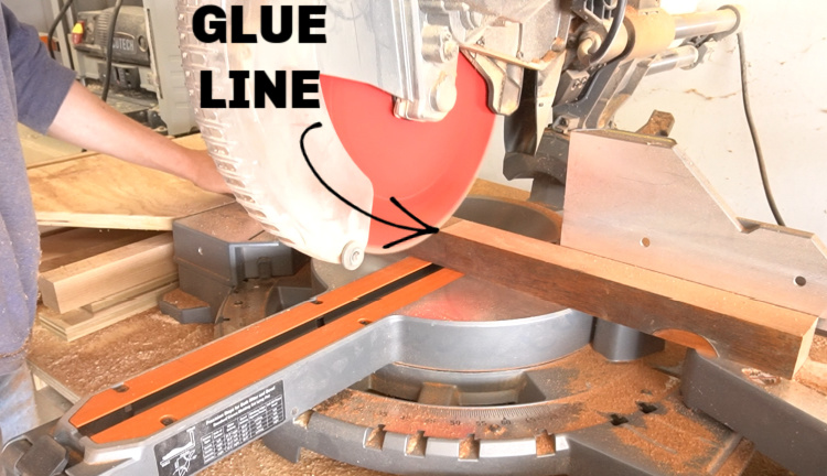 Using miter saw to trim strips along glue line to give solid wood pieces