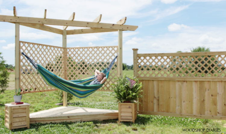 Shara laying in hammock on floating deck stand small