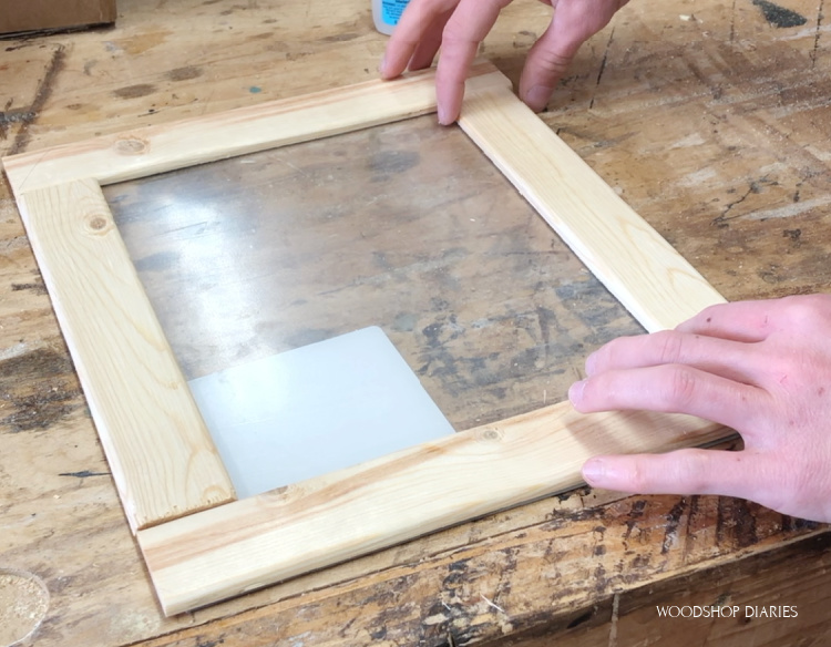 Test fit shims around plexiglass sheet to make frame