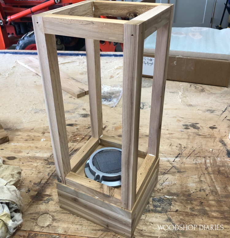 Top outdoor scrap wood lantern frame attached to bottom base box