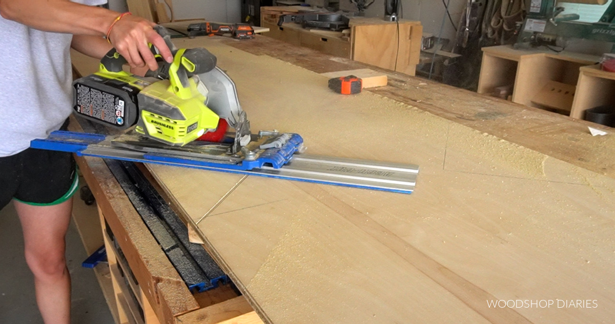 Shara Woodshop Diaries using circular saw to cut out back panel of vinyl record album shelf