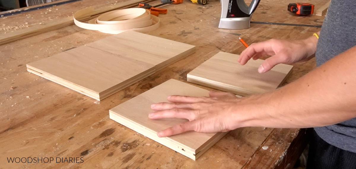 pieces of keepsake box cut and laid out on workbench ready to assemble