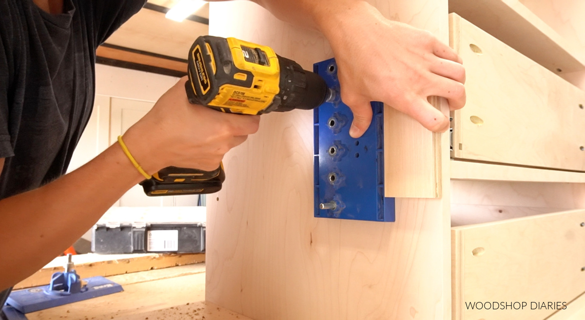 Using shelf pin jig to drill shelf pin holes into cabinets for adjustable shelves