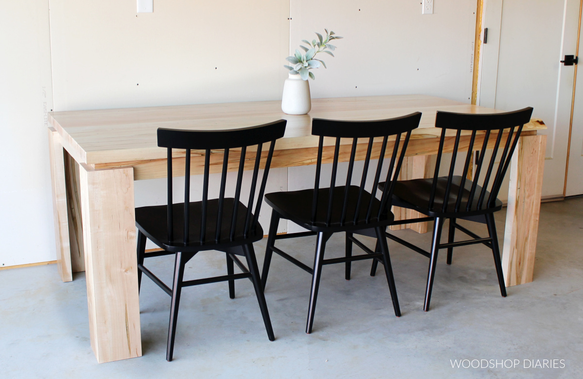 Modern DIY dining table with black chairs